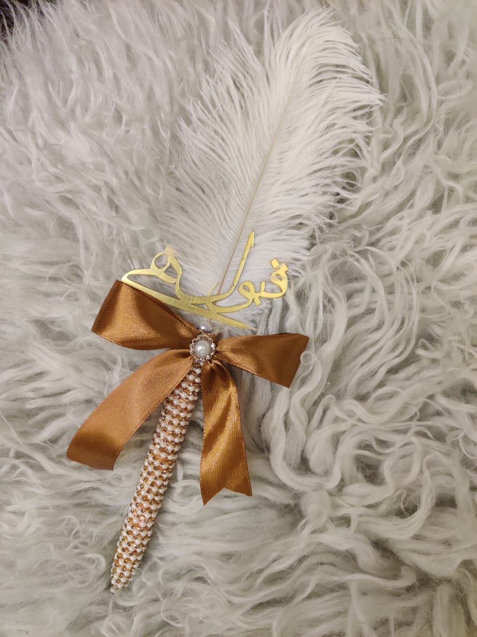 modern nikkah pen with ribbon tie and feather