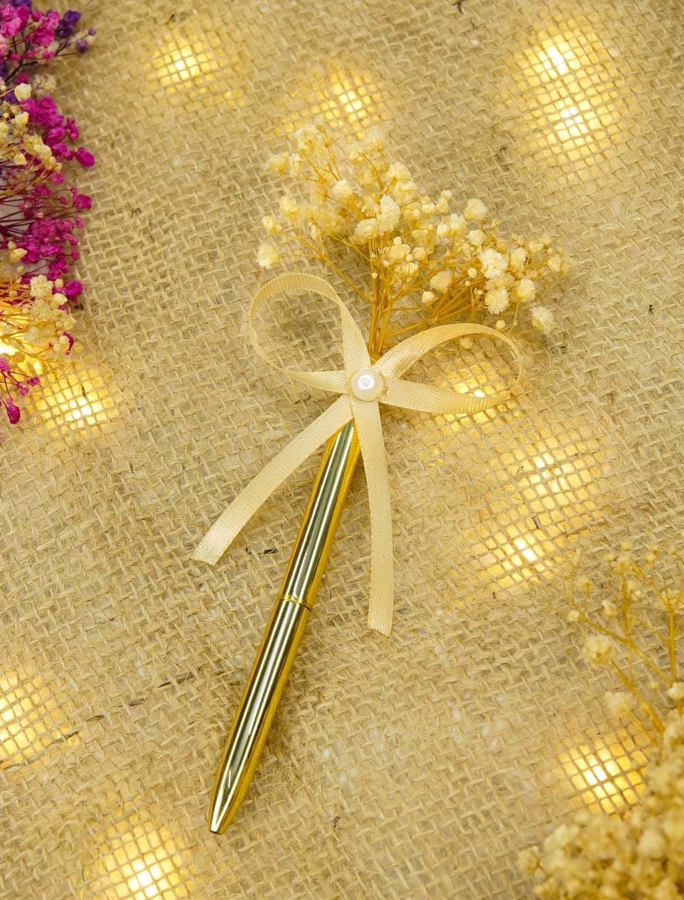 Fancy and decorative pen with bow and small flowers